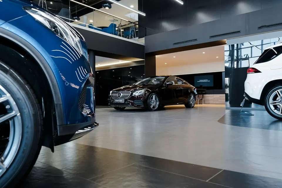 Car dealership showroom with new vehicles on display